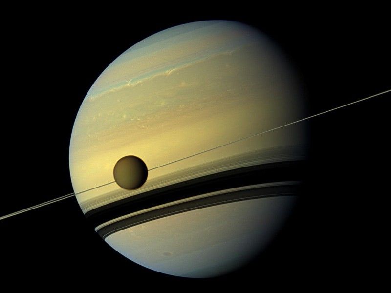 Titan passing in front of Saturn